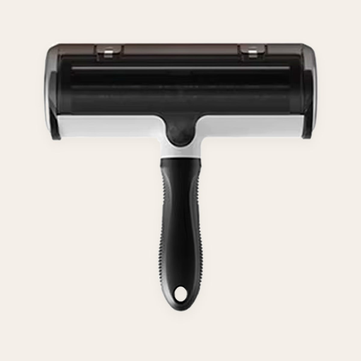 Rouleau anti-poils réutilisable FINIPOIL vu de dessus : couvercle fumé, base blanche et manche ergonomique noir