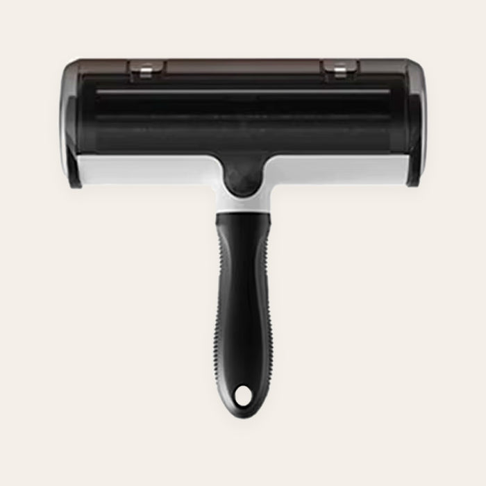 Rouleau anti-poils réutilisable FINIPOIL vu de dessus : couvercle fumé, base blanche et manche ergonomique noir